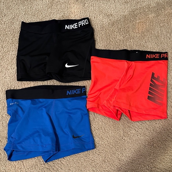 Nike Pro women’s Shorts - Black, Red, Blue Trio - Picture 1 of 2